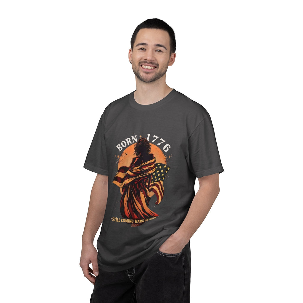 Naughty250 charcoal grey cotton t-shirt with a graphic of a figure wrapped in the American flag, text "Born 1776"