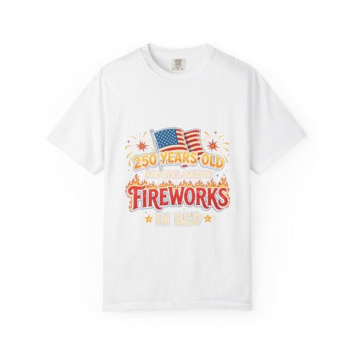 Naughty250 white cotton t-shirt with retro fireworks graphic, American flags, and text "250 Years Old & Still Making Fireworks In Bed".