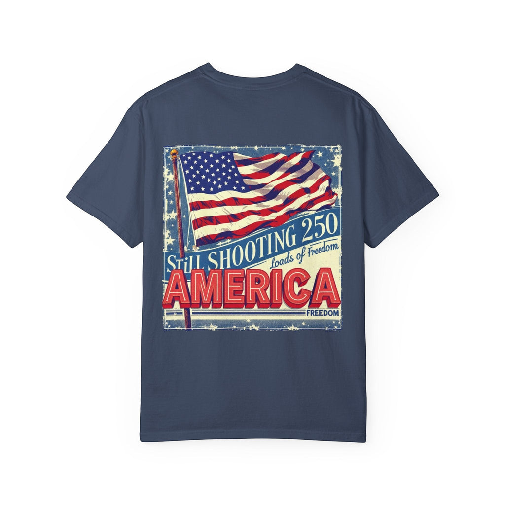 Naughty250 navy blue heavyweight cotton tee with retro American flag graphic and "Still Shooting 250 America Loads of Freedom" text.